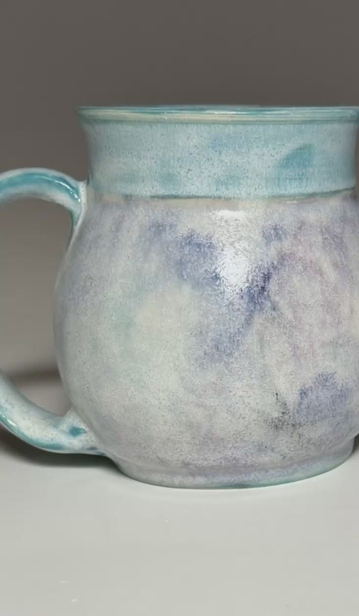 hand made belly shaped pottery mug